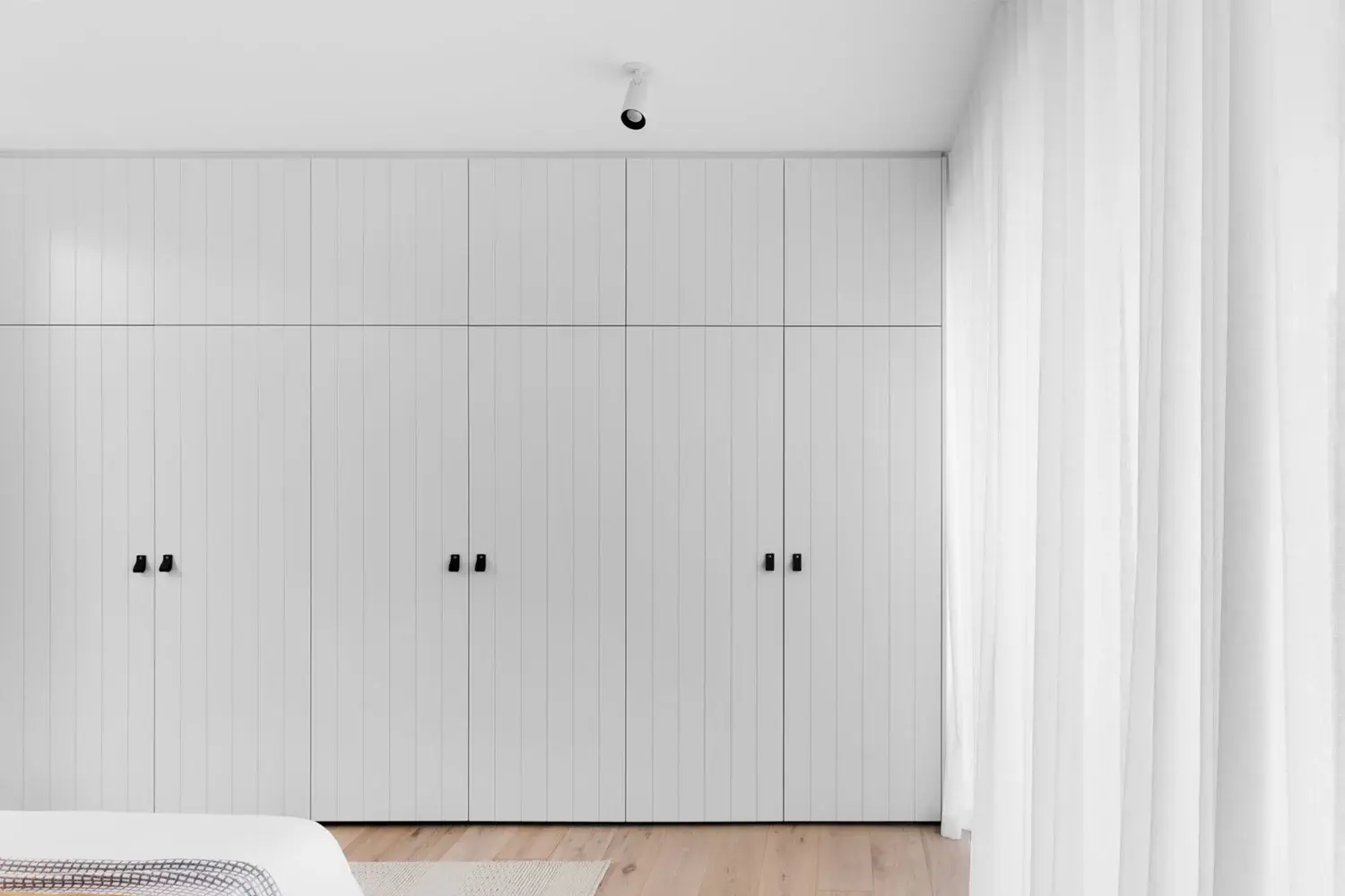 Built-in storage and floor-to-ceiling cabinetry